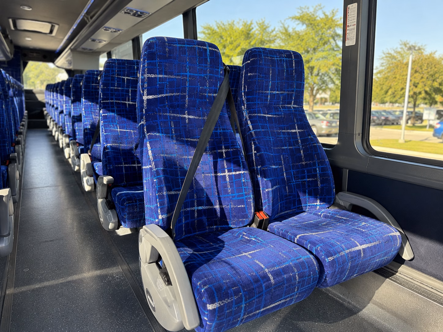 how starting location and deadhead affect charter bus rates in warren michigan